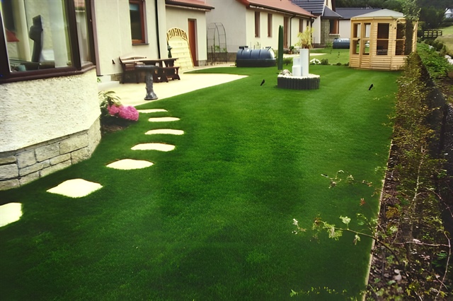 Paving stones installed in turf